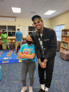 Hornets player with student